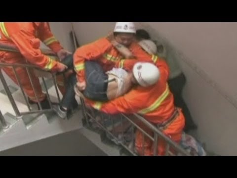 suicide - Firefighters in China's southern Guangxi Zhuang Autonomous Region saved a suicidal man by catching him in mid-air. Firefighters had to mount a daring rescue ...