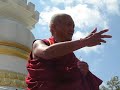 Lama Zopa Rinpoche at Institut VajraYogini in France, in front of Kadampa stupa, explaining how to think when you offer a flower to a stupa. For more information: www.fpmt.org