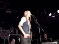 aimee mann singing you're with stupid now as requested by a fan at sheffield leadmill 23rd october 2008.  

this song was written about labour mp tony banks with whom she became friends with after he invited her to dinner at the houses of parliament.