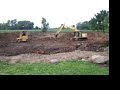 Start of Pond Digging Start of Pond Digging