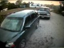 Frantic Woman moves car in the middle storm