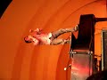 Ben Folds directing the audience on top of the piano