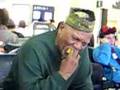 Baba Oje eating Mango in LAX