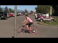 Practicing no-hands and foot-through-the-frame (regular and switch) trackstands in the Spanish Banks parking lot
