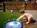 Tobbe dives into pool...