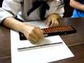 Japanese girl doing abacus
