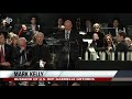 US Rep. Gabrielle Giffords led the pledge of allegiance at a memorial ceremony for the