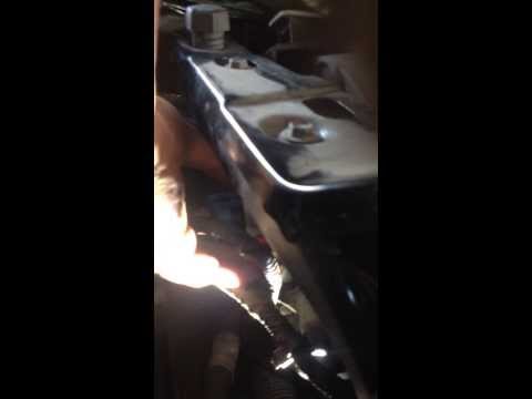 How to change a 2005 Jeep Liberty  Head Light