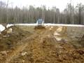 Takeuchi Skid steer Pushing Dirt