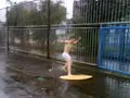 skimboardning on ice house puddles