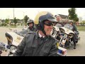 Rick rides with the Ontario Provincial Police's precision motorcycle team in Fergus, Ontario.
