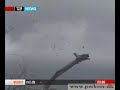 Wind turbine crashing in storm