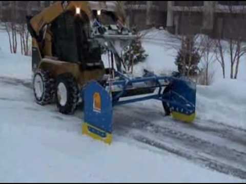 Snow Removal - The Kage snow removal system combines plowing and snow containment into one revolutionary new implement. It is for skid steers, loaders and tractors. In just...
