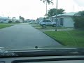 School Kids wait for the bus in the MIDDLE OF THE ROAD