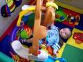 Daniel playing with his gym: 10-9-08