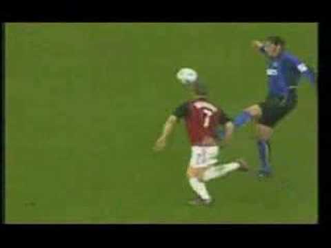 Marco Materazzi. Materazzi' in action: fouling and getting nutted.
