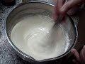 Mixing the batter for making Arab style Deep Fried Dough