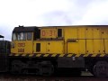 Una doble traccion formada por las B&W UM-11b D30 y D31 remolca dos pesados torpedos cargados de arrabio sobre el viaducto de Pervera, en la linea que conecta las dos plantas de Arcelor en Asturias.