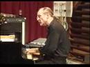 Satish Krishnamurthy,on kanjira with piano and bass guitar