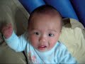 Cute baby boy  chasing a book and play