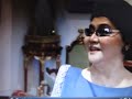 imelda marcos showing her valued treasures and a sum of $987billion to a bbc uk reporter