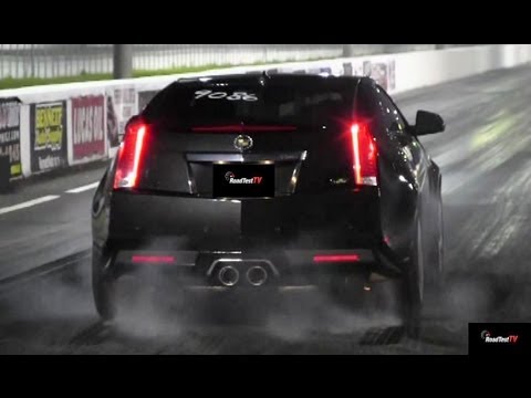 drag race - http://www.RoadTestTV.com A 2008 Shelby Mustang GT500 with pulley, tune, exhaust, and drag radials takes on our bone stock 2013 Cadillac CTS-V Coupe. The CTS...