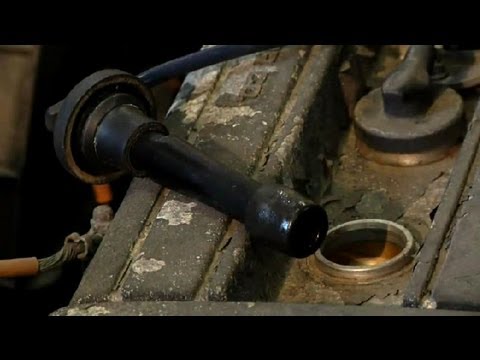 How to Remove Oil From a Spark Plug Well : Car Repair Tips