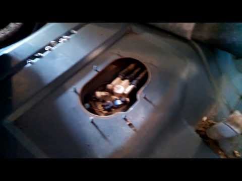 Fuel pump replacement 1999 Buick Century Access cover in trunk
