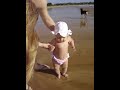 Melissa na praia pela 1a vez