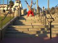 Handstand Walking down big set of stairs at huntington beach