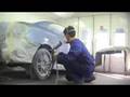 Kyle painting a Scion TC.