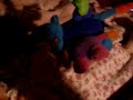 cameron swatting at her toys