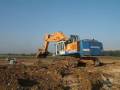 videos de Liebherr R964B loading two A40D