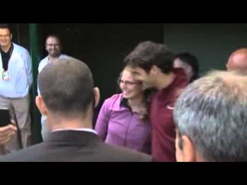 Federer fan takes tumble