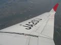 J-Air CRJ-200 in flight over Japan - window view