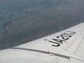 J-Air CRJ-200 in flight over Japan - window view
