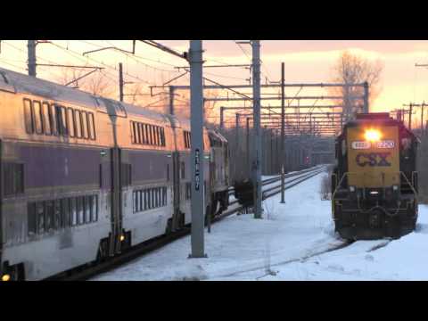 CSX locomotive - Caught this single CSX locomotive connecting to the North East Corridor from a siding right before Rt.128 train station. This guy was blasting his horn for q...