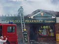 HUGHES SUPERMARKET CAMLOUGH FIRE JULY 2002