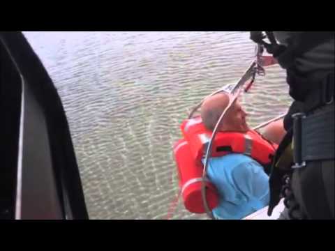 USCG helicopter rescue video of 4 people from stranded casino boat