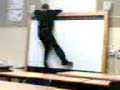 a boy called toby wing jumping from a table then hanging on to dear life to the white board funny stuff in world issues.  enjoy