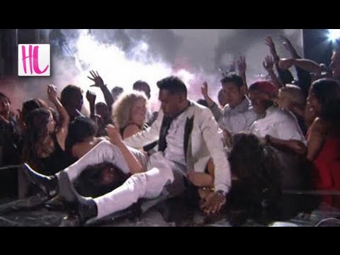 Lands - Miguel jumps into the audience and lands on a fan's head during his performance of 'Adorn' at the Billboard Awards 2013. The freak accident reportedly hurt t...