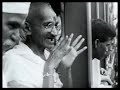 about 1930 gandhi in group, crowds fighting to get close to gandhi, cu gandhi, crowds, gandhi speaking, crowds, gandhi speaking. 1931: sign bombay port trust hotel crowds say goodbye to gandhi who is headed for london conference to determine india's fate in the british republic, cu gandhi hands clasped, rear shot of gandhi at rail of ship. gandhi on board ship en route to london has feet massaged, gandhi spinning, gandhi playing with baby, laughing. gandhi and party descend gangplank in england, gandhi is escorted to car. gandhi inside car, crowd, gandhi attracts crowd as he stands on balcony. 1932: gandhi relaxing at victoria hall, geneva where he gives address.