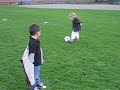 Emmaline playing soccer with one of her frineds!
