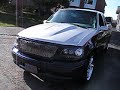 mikes ford f-150 riding on 22's and air ride hitting the switches.