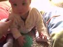 Ailsa sitting up and playing ball Ailsa sitting up and playing ball