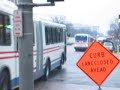 WMATA Neoplan AN460 crossing Pennsylvannia Avenue