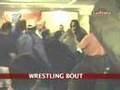 Wrestler-scribe scuffle at presser
