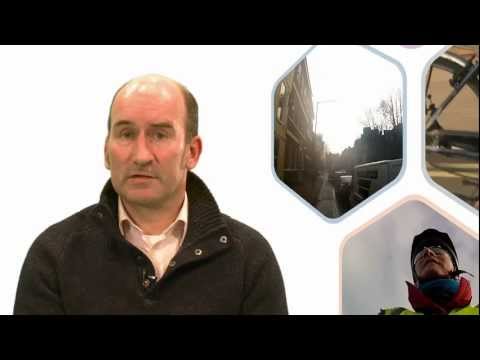 film of cycling to the child minders with a child bike trailer