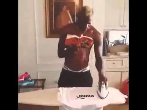 dancing - Mario Balotelli dancing with ibrahimovic's book in his hand.