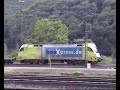 Gemünden at the Main river (Germany): Is it the ultimate Freight train paradise? It is not unusual that 2 or even three freight or passenger trains can be seen at the same time, as this railroad video demonstrates.PLEASE ALSO WATCH THE OTHER 3 PARTS!I had the impression every single German private railway companies has sent me a locomotive to put it on video...Gemünden/Main ist ein wahres Eisenbahn-Paradies: Massenweise Güterzüge! Oft sogar 2 Güterzüge oder Personenzüge nebeneinander. *******Güterzug personenzug regionalexpress Taurus HGK TRAXX BR 140 145 151 152 155 182 111 189 185 186 Crossrail WLE diesellok ellok lokomotiven